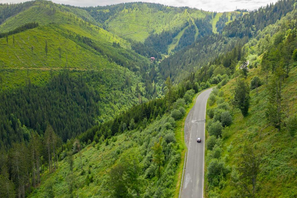 A car driving through the mountains in Oregon